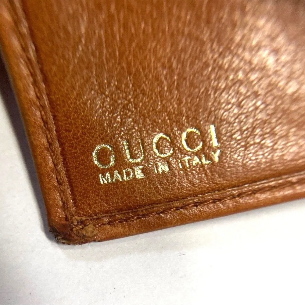 VINTAGE GUCCI LOGO EMBOSSED SOFT LEATHER WALLET - Picture 8 of 16